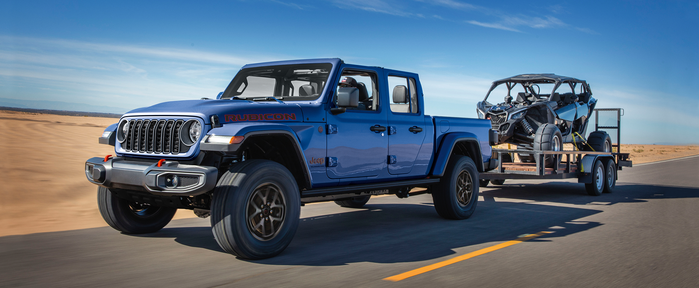 The Uconnect touchscreen in the 2025 Jeep Gladiator displaying one of the Off-Road Adventure Guides.